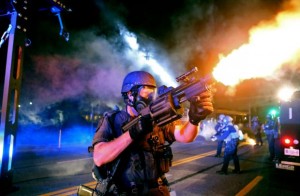Ferguson-Police-fires-tear-gas-8-18-14
